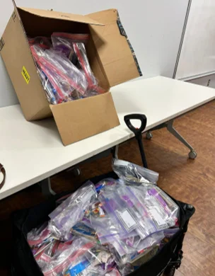 Pittsburgh Cares packing and signing cards event